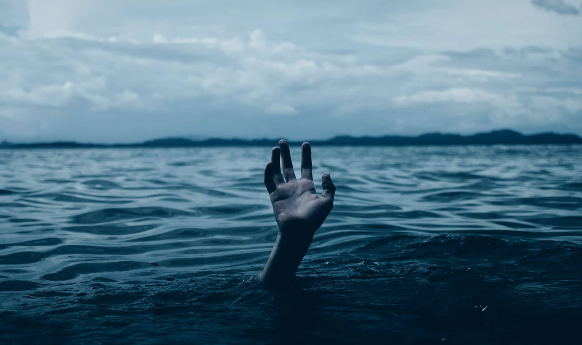 Drowning Hand in Ocean